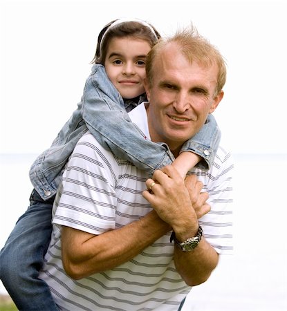 simsearch:400-07715953,k - father and daughter having fun outdoors Stock Photo - Budget Royalty-Free & Subscription, Code: 400-05875981