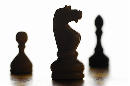 simsearch:400-04398584,k - wooden chess pieces are standing on board Fotografie stock - Microstock e Abbonamento, Codice: 400-05876003