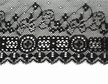 simsearch:400-05677711,k - Decorative white lace on insulated black background Foto de stock - Royalty-Free Super Valor e Assinatura, Número: 400-05876015