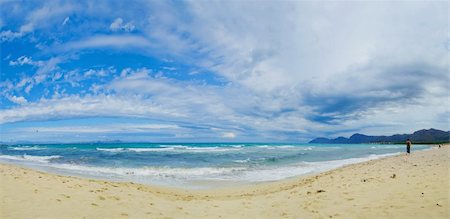 simsearch:400-07508735,k - Beautiful blue Beach Mallorca panoramic sea view on a windy day. Waves, sea, clouds, blue sky, concept of vacation Stockbilder - Microstock & Abonnement, Bildnummer: 400-05876102