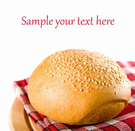 newly baked bread on a white background Stock Photo - Budget Royalty-Free & Subscription, Code: 400-05876198