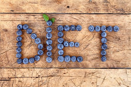 simsearch:400-06698338,k - Fruit diet with blueberries on rustic wooden background Stock Photo - Budget Royalty-Free & Subscription, Code: 400-05876307