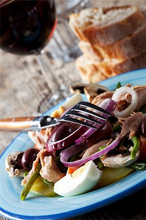 salade nicoise - french salad nicoise on a plate Stock Photo - Budget Royalty-Free & Subscription, Code: 400-05876398