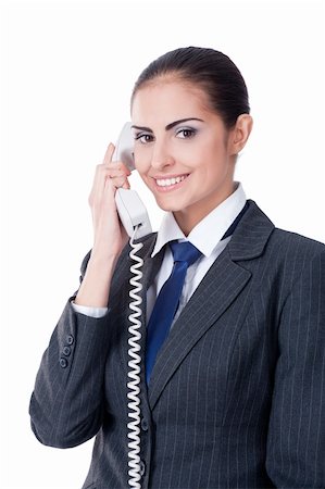 Young businesswoman speaking on phone, smiling, isolated on white Stock Photo - Budget Royalty-Free & Subscription, Code: 400-05876755