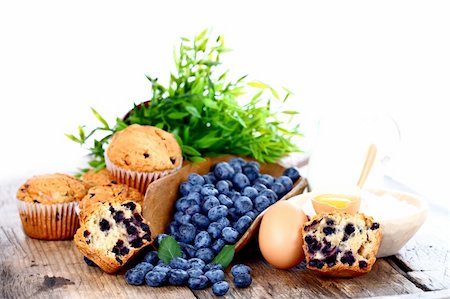 simsearch:400-06698338,k - Fresh blueberries with muffins and ingredients, rustic style Stock Photo - Budget Royalty-Free & Subscription, Code: 400-05876865