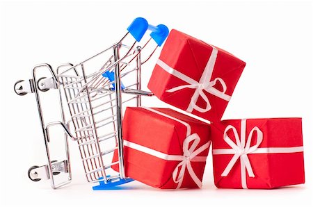 crashed shopping cart with a lot of gifts cut out from white Stock Photo - Budget Royalty-Free & Subscription, Code: 400-05876940