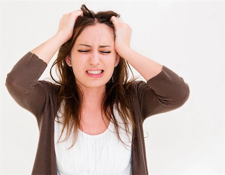 people in panic - Young panic woman with hands on the head Stock Photo - Budget Royalty-Free & Subscription, Code: 400-05876996