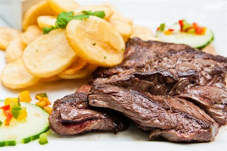 simsearch:400-05664697,k - juicy steak beef meat with tomato and french fries Stock Photo - Budget Royalty-Free & Subscription, Code: 400-05877016