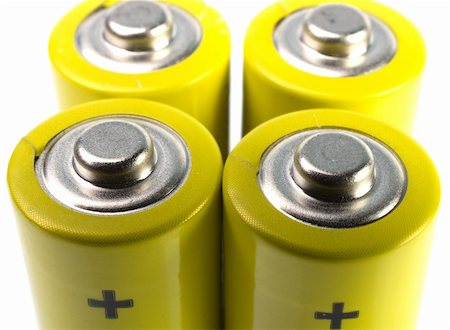 simsearch:400-06109171,k - Yellow battery isolated over white background Stock Photo - Budget Royalty-Free & Subscription, Code: 400-05877071