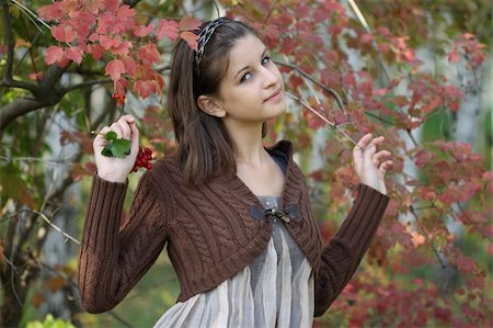 simsearch:400-07042487,k - Portrait of the young girl in the autumn forest Stock Photo - Budget Royalty-Free & Subscription, Code: 400-05877122