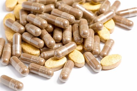 Medicinal pills piled up a bunch of closeup Stock Photo - Budget Royalty-Free & Subscription, Code: 400-05877194
