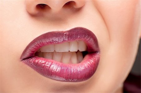 Perfect shiny woman's lips close up shoot Stockbilder - Microstock & Abonnement, Bildnummer: 400-05877313