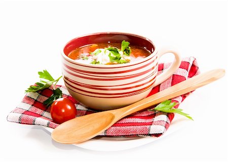 simsearch:400-07298426,k - tomato soup with tomatoes in background ower white Stock Photo - Budget Royalty-Free & Subscription, Code: 400-05877752