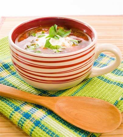 simsearch:400-07298426,k - tomato soup with tomatoes in background ower white Stock Photo - Budget Royalty-Free & Subscription, Code: 400-05877753