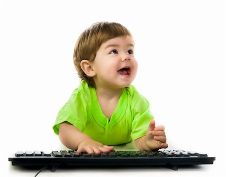 simsearch:400-04093413,k - Little child holding keyboard over white background Stock Photo - Budget Royalty-Free & Subscription, Code: 400-05877766