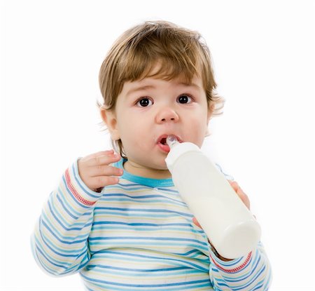 Little boy with the bottle of a milk Stock Photo - Budget Royalty-Free & Subscription, Code: 400-05877769