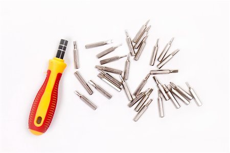 pergamepaper (artist) - yellow screwdriver heads toolkit isolated on white Photographie de stock - Aubaine LD & Abonnement, Code: 400-05877819