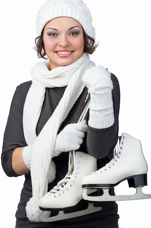 skating ice background - Pretty girl with figure skates on her shoulders Stock Photo - Budget Royalty-Free & Subscription, Code: 400-05877830