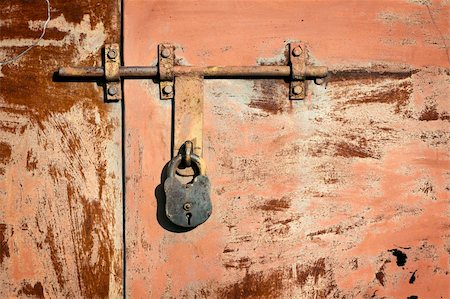 Grunge metal door with padlock Stock Photo - Budget Royalty-Free & Subscription, Code: 400-05878104
