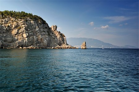 sierra - Blue lagoon with rocks in Crimea Foto de stock - Royalty-Free Super Valor e Assinatura, Número: 400-05878218