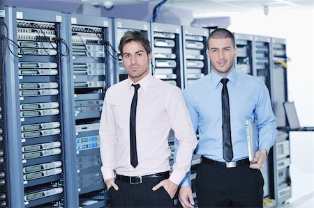 simsearch:400-03917797,k - group of young business people it engineer in network server room solving problems and give help and support Stock Photo - Budget Royalty-Free & Subscription, Code: 400-05878610