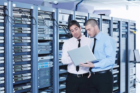 simsearch:400-03917797,k - group of young business people it engineer in network server room solving problems and give help and support Stock Photo - Budget Royalty-Free & Subscription, Code: 400-05878611