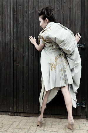 Modern fashionable brunette japanese woman posing outdoors Stockbilder - Microstock & Abonnement, Bildnummer: 400-05878783
