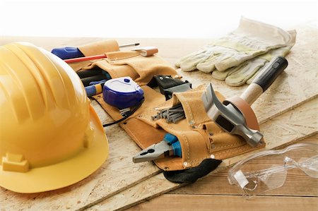 simsearch:640-02773025,k - Yellow helmet and tool belt. Stock Photo - Budget Royalty-Free & Subscription, Code: 400-05878904