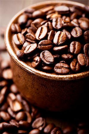 dark roasted coffee beans in a small dish Stock Photo - Budget Royalty-Free & Subscription, Code: 400-05878975