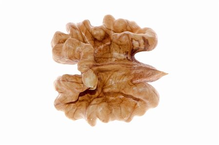 simsearch:400-04180817,k - Unshelled nut isolated on a white background. Photographie de stock - Aubaine LD & Abonnement, Code: 400-05879065