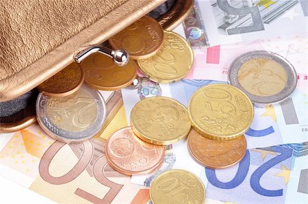 ruigsantos (artist) - Euro bills and coins coming out of a wallet Fotografie stock - Microstock e Abbonamento, Codice: 400-05884009