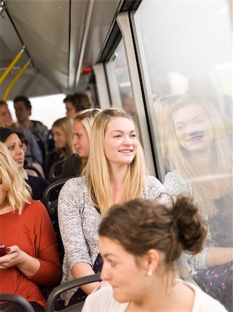 Happy woman on the bus Stock Photo - Budget Royalty-Free & Subscription, Code: 400-05884026