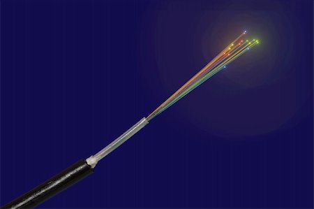 color fiber optic cable on blue background Stock Photo - Budget Royalty-Free & Subscription, Code: 400-05884307