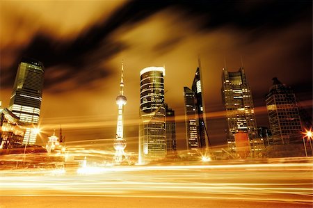 skyline drive - the light trails on the modern building background in shanghai china. Photographie de stock - Aubaine LD & Abonnement, Code: 400-05884516