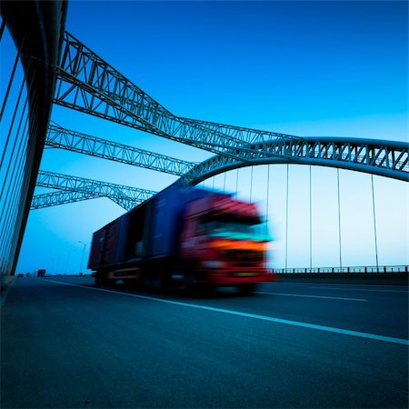 simsearch:622-02759352,k - speeding truck go through the bridge. Stock Photo - Budget Royalty-Free & Subscription, Code: 400-05884526