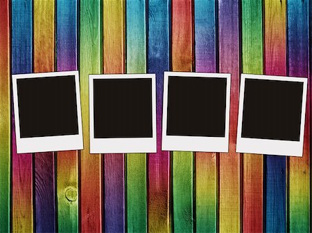 simsearch:400-06869842,k - four blank photos on colorful wooden background Stock Photo - Budget Royalty-Free & Subscription, Code: 400-05884702