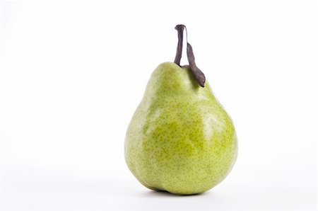 pear with leaves - ripe pear shot on a white studio background Stock Photo - Budget Royalty-Free & Subscription, Code: 400-05884772