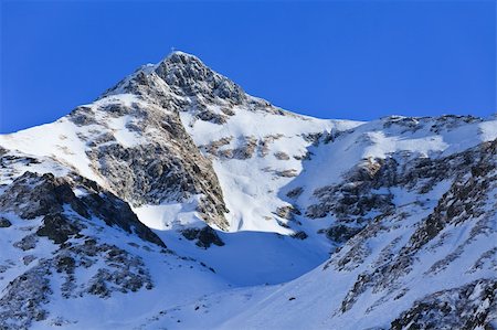 simsearch:400-07298343,k - winter mountain landscape with a blue sky, Fagaras Mountains, Romania Fotografie stock - Microstock e Abbonamento, Codice: 400-05885099