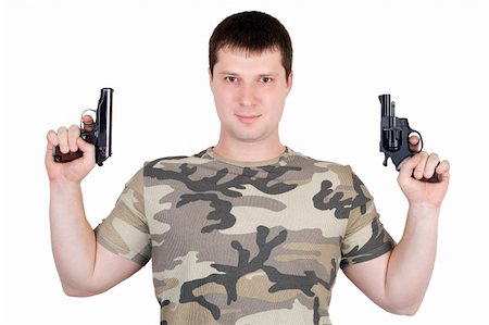 simsearch:400-05883228,k - Young man with a two pistol. Isolated Foto de stock - Royalty-Free Super Valor e Assinatura, Número: 400-05885113
