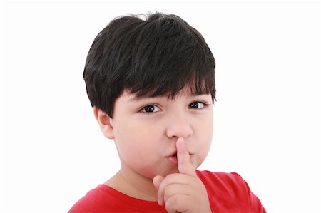 simsearch:400-04820733,k - shh. secret - Young boy with his finger over his mouth Stockbilder - Microstock & Abonnement, Bildnummer: 400-05885165