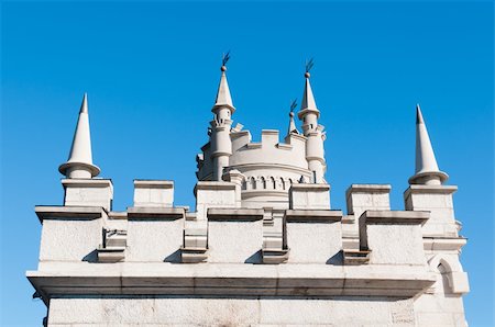 Fantastic castle: Swallow's Nest Castle tower, Crimea, Ukraine, with blue sky and sea on background Stock Photo - Budget Royalty-Free & Subscription, Code: 400-05886013