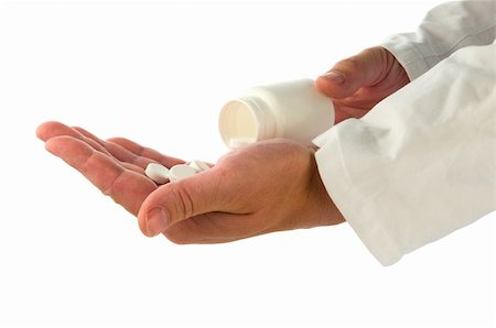 Doctor's hands with white bottle and pills on white background Stock Photo - Budget Royalty-Free & Subscription, Code: 400-05886032