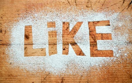 social media likes - Like word on flour and wooden background Stock Photo - Budget Royalty-Free & Subscription, Code: 400-05886156