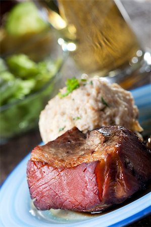 pig roast - bavarian roast pork dish with dumpling Stock Photo - Budget Royalty-Free & Subscription, Code: 400-05887000