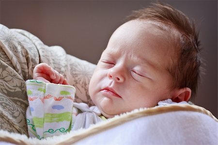 Cute baby girl sleeping  and dreaming Fotografie stock - Microstock e Abbonamento, Codice: 400-05887048