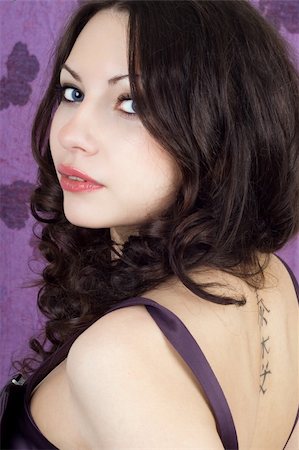 simsearch:400-05887132,k - Portrait of the young woman with a tatoo Stock Photo - Budget Royalty-Free & Subscription, Code: 400-05887130