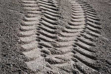 Tire print from heavy vehicle in sand Stock Photo - Budget Royalty-Free & Subscription, Code: 400-05887254