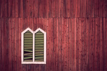 Red wooden rustic wall with window and broken shutters Stock Photo - Budget Royalty-Free & Subscription, Code: 400-05887256