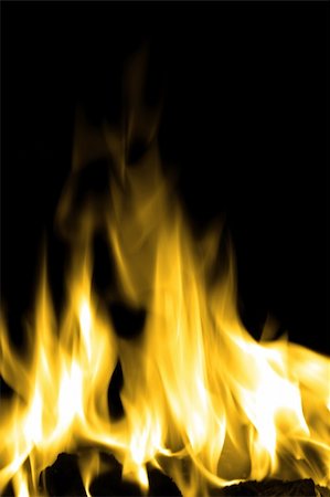 bright flames on an open fire that give that warm feeling Photographie de stock - Aubaine LD & Abonnement, Code: 400-05888614