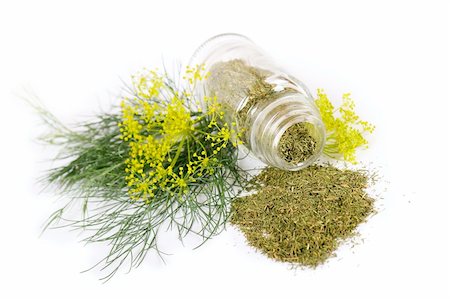 scattered spices - Glass bottle with dill on white background Stock Photo - Budget Royalty-Free & Subscription, Code: 400-05888780